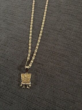Gold Sponge Bob Character Pendant Necklace on a Valentino chain.- 18 inch